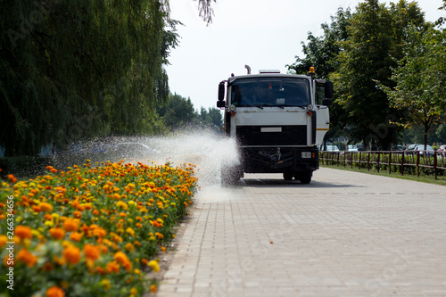 truck watering flowers