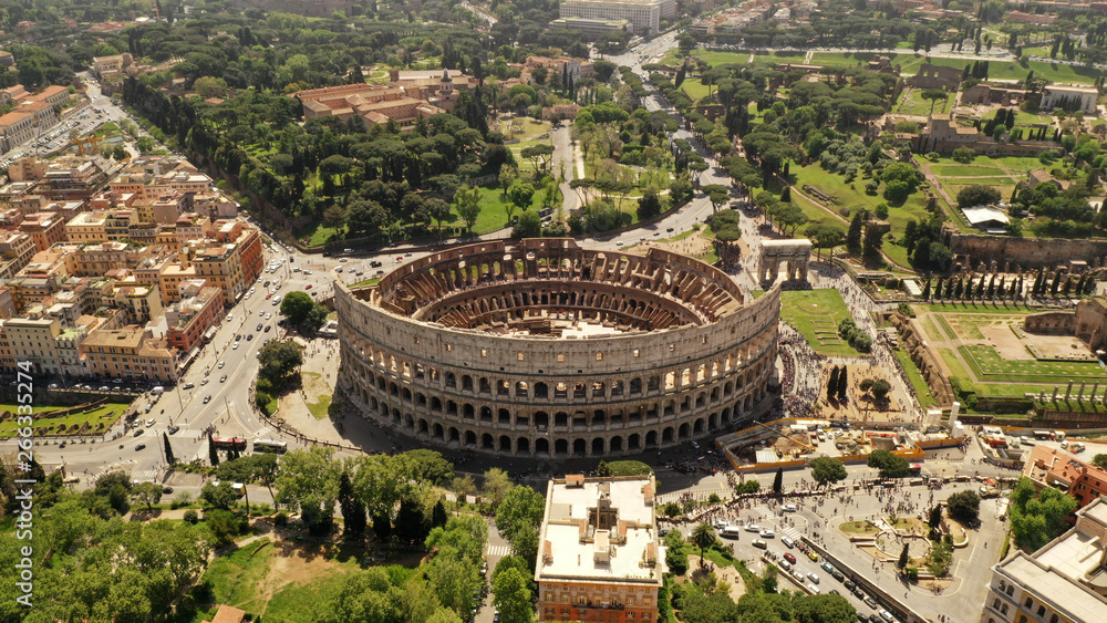 Aerial view on the Coliseum, Rome, Italy. Spring, summer. Ancient Rome architecture from drone. - obrazy, fototapety, plakaty 