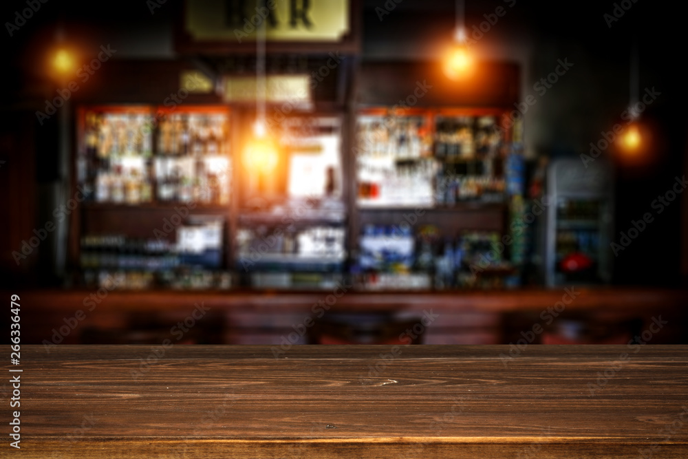 Table background of free space and blurred background of bar Table background of free space and blurred background of bar