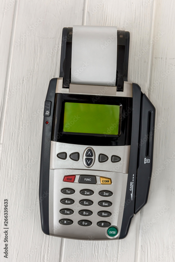 Paying terminal on light background close up Paying terminal on light background close up