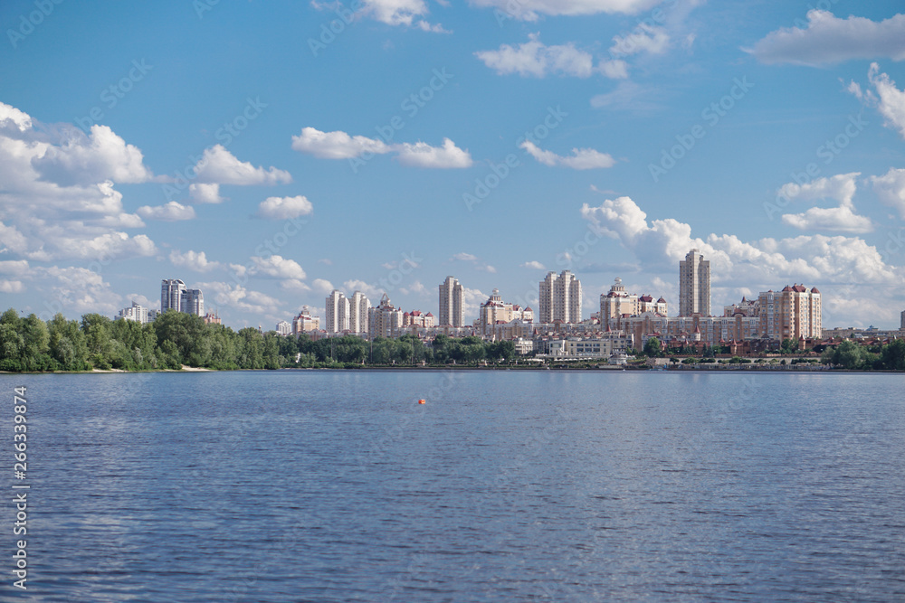 Beautiful city of Kiev in the summer, spring. River Dnieper with a beautiful sky. Stock photo Beautiful city of Kiev in the summer, spring. River Dnieper with a beautiful sky. Stock photo