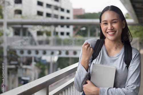 Fotografie portrait of happy, smiling, successful, confident asian woman college student po