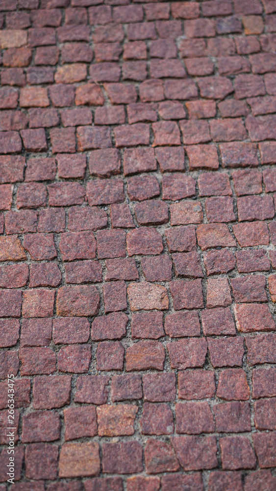 Old cobblestone alleys, roads. Texture of reddish cobblestones pavement. Stock photography Old cobblestone alleys, roads. Texture of reddish cobblestones pavement. Stock photography