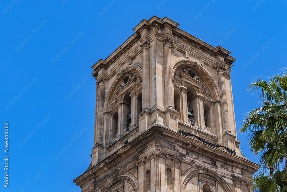 Bell tower of Roman Catholic Granada Cathedral or Cathedral of Incarnation (Catedral de Granada, Santa Iglesia Catedral Metropolitana de la Encarnacion de Granada, 1561). Granada, Andalusia, Spain.