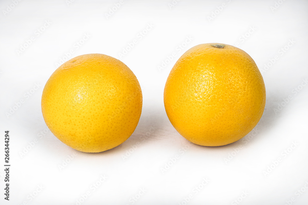 Juicy oranges on a white isolated background. Vegetarian food. Stock photo Juicy oranges on a white isolated background. Vegetarian food. Stock photo