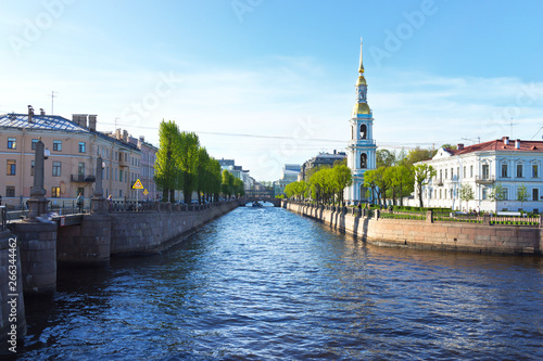 St. Petersburg. Place of Seven Bridges. The Kryukov Canal Embankment, Bell Tower of Nikolsky Naval Cathedral  (Nikolskiy Morskoy Sobor) and in the distance the new building of the Mariinsky Theater  photo