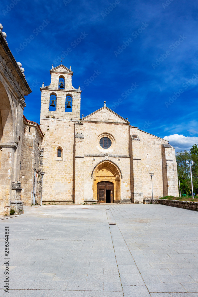 Sunny exterior view of the Church of San Juan de Ortega Monastery at Barrios de Colina, Province of Burgos, Castilla y Leon, Spain