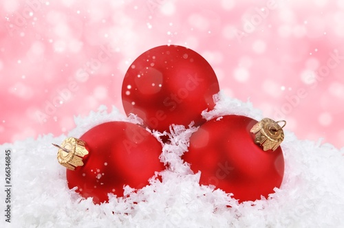 Christmas balls in snowflakes on white background