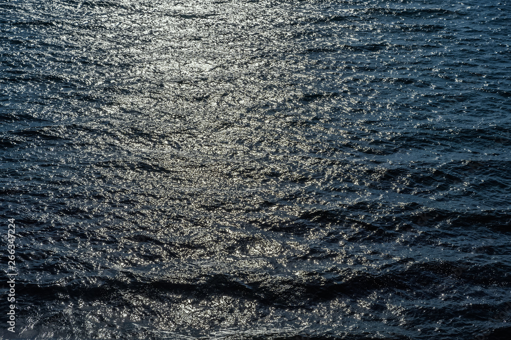 Sea surface as natural background, color toned. Sea surface as natural background, color toned.