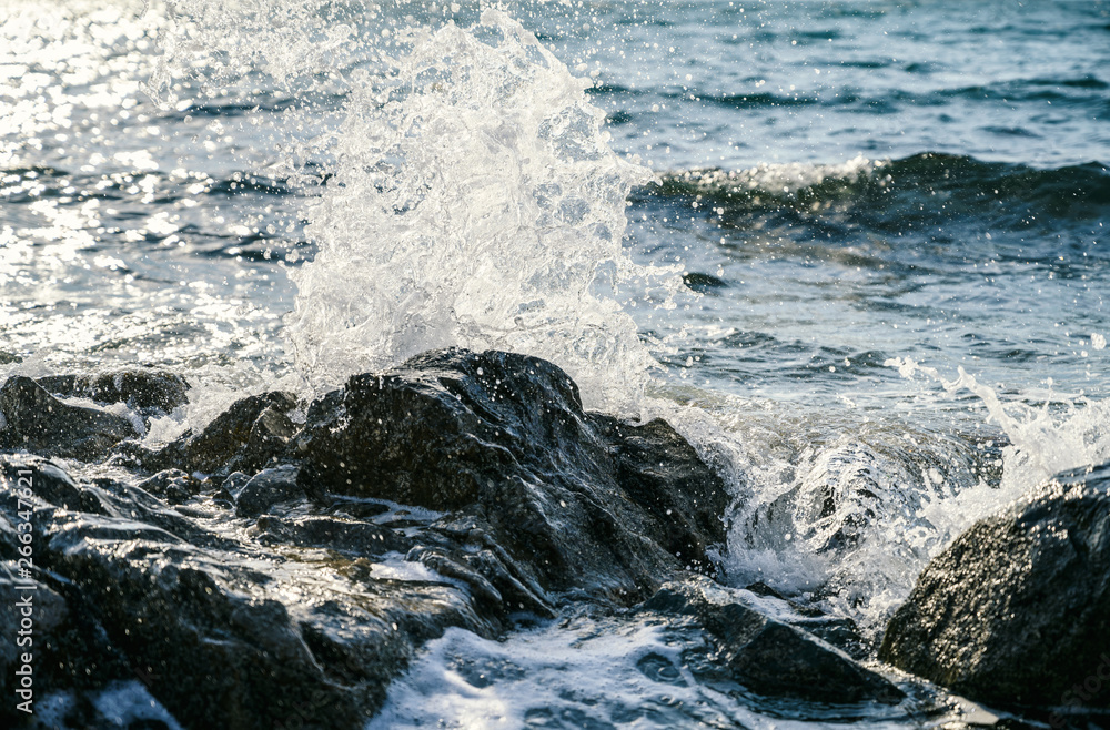 Waves at the seashore. Selective focus with shallow depth of field. Waves at the seashore. Selective focus with shallow depth of field.