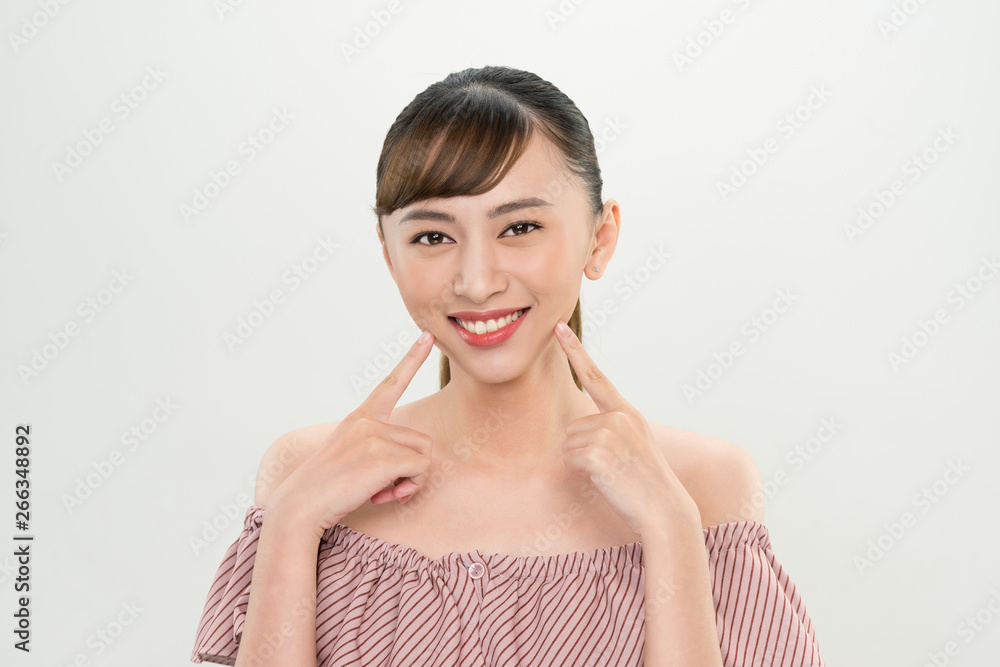 closeup young smiling woman face isolated on white closeup young smiling woman face isolated on white