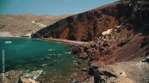 Red Beach on the Greek Island of Santorini. Popular place where most tourists go when visiting Greece. Timelapse photo