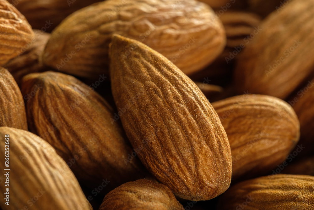 Healthy food. Fresh almond closeup on wooden table Healthy food. Fresh almond closeup on wooden table