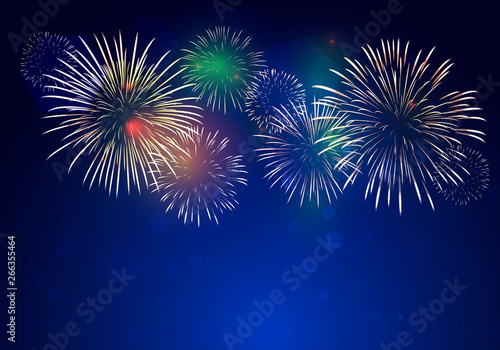 colorful fireworks vector on dark blue background with sparking bokehs