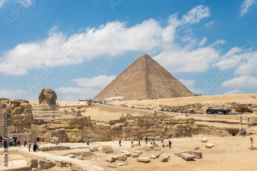 Giza, Egypt - April 19, 2019: The pyramid of Khufu and the Great Sphinx of Giza, Egypt