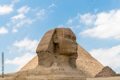 The Sphinx stand at the pharaoh s entrance tomb complex in Giza