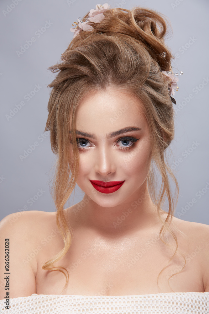 portrait of handsome blonde with curls and open shoulderd portrait of handsome blonde with curls and open shoulderd