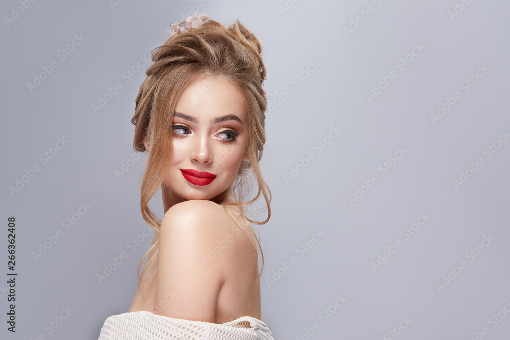 blondie with perfect volumed hairstyle looking to the side blondie with perfect volumed hairstyle looking to the side