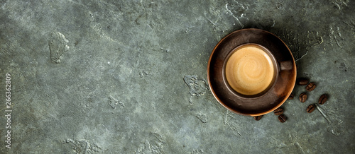 Cup of coffee on rustic background