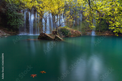 Fototapeta Naklejka Na Ścianę i Meble -  Stunning waterfalls with small emerald lake in deep green forest in Kursunlu Natural Park, Antalya, Turkey