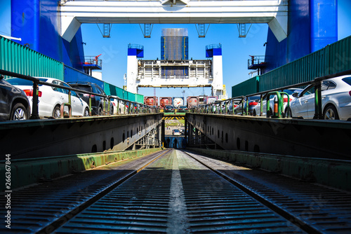 Marine ferry, cargo decks, for cars and trains
