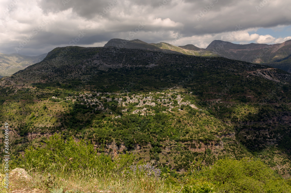 Obraz premium Traditional greek village Kalarrytes (Epirus, Greece).