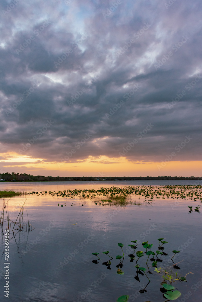 sunset over Lake Josephine on a cloudy evening sunset over Lake Josephine on a cloudy evening