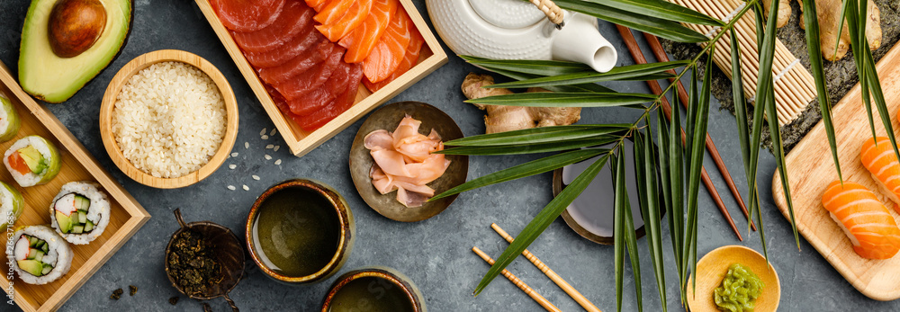 Overhead shot of ingredients for sushi on dark blue background - obrazy, fototapety, plakaty 