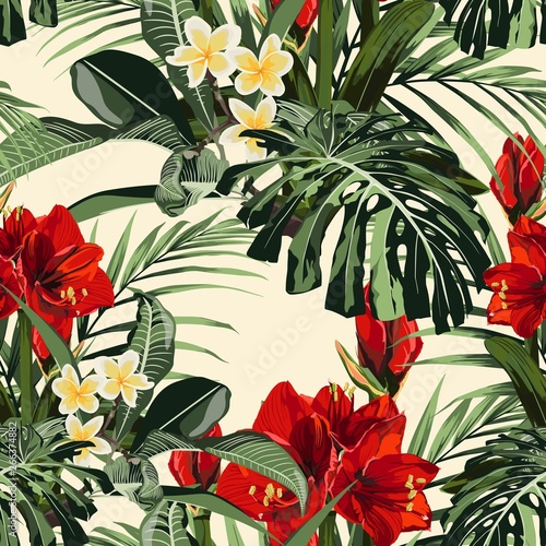 Seamless pattern with tropical leaves and paradise red lilies flowers. Bright green palm monstera leaves on the yellow background. Tropical illustration. Jungle foliage. 