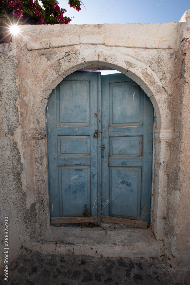 Blue painted door in Santorini