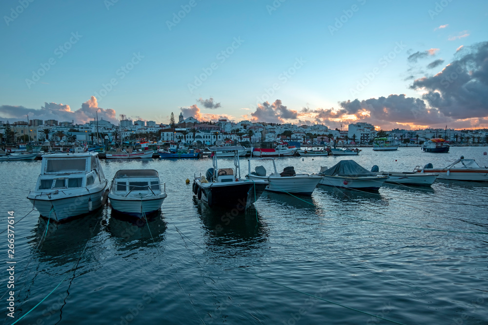 View on the harbor from Lagos in the Algarve Portugal at sunset