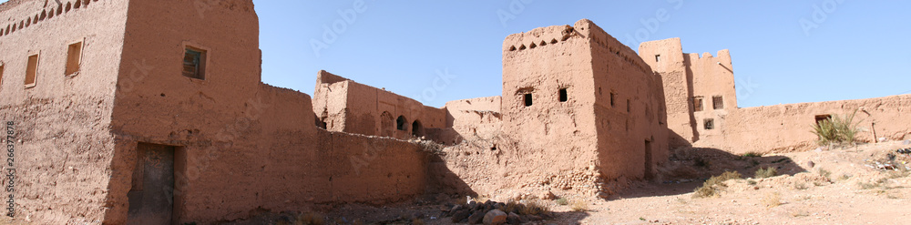 Panoramic photos of buildings and ancient historical places called alqasbat and oases and natural mountains in Morocco are located in the Ouarzazate region near the Moroccan Sahara