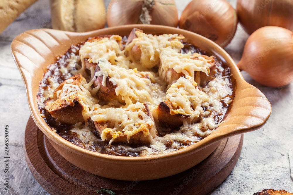 Delicious onion soup with croutons and cheese Delicious onion soup with croutons and cheese