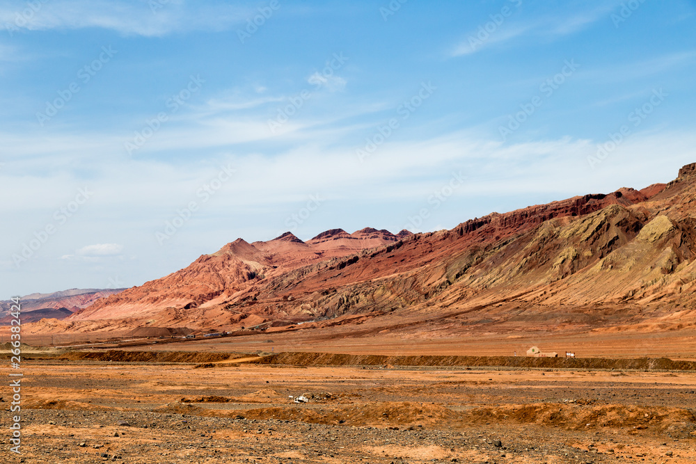 Flaming mountains, Turpan, Xinjiang, China: these intense red arid mountains similar to scorching flames appear in the Chinese epic “Journey to the west”. Turpan is an ancient oasis on the Silk Road
