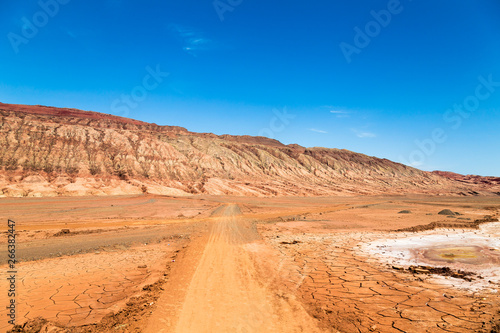 Flaming mountains  Turpan  Xinjiang  China  these intense red arid mountains similar to scorching flames appear in the Chinese epic    Journey to the west   . Turpan is an ancient oasis on the Silk Road
