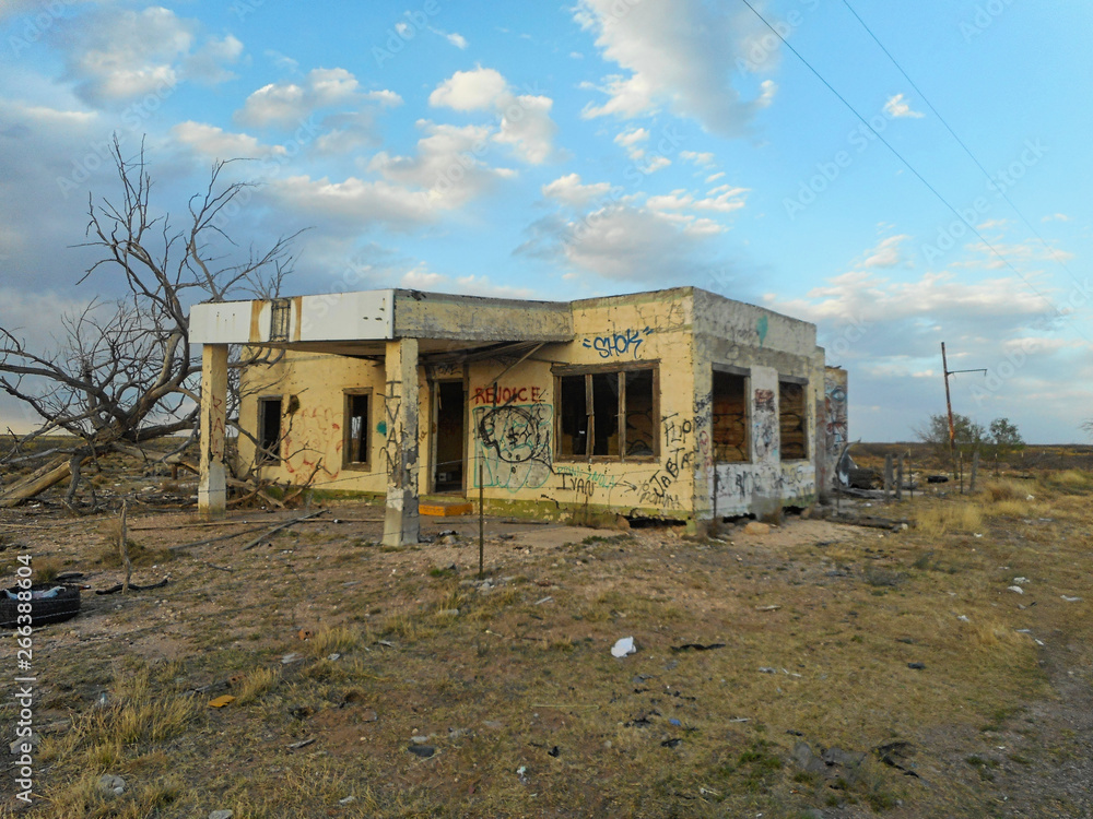 an old house ruin with graffiti