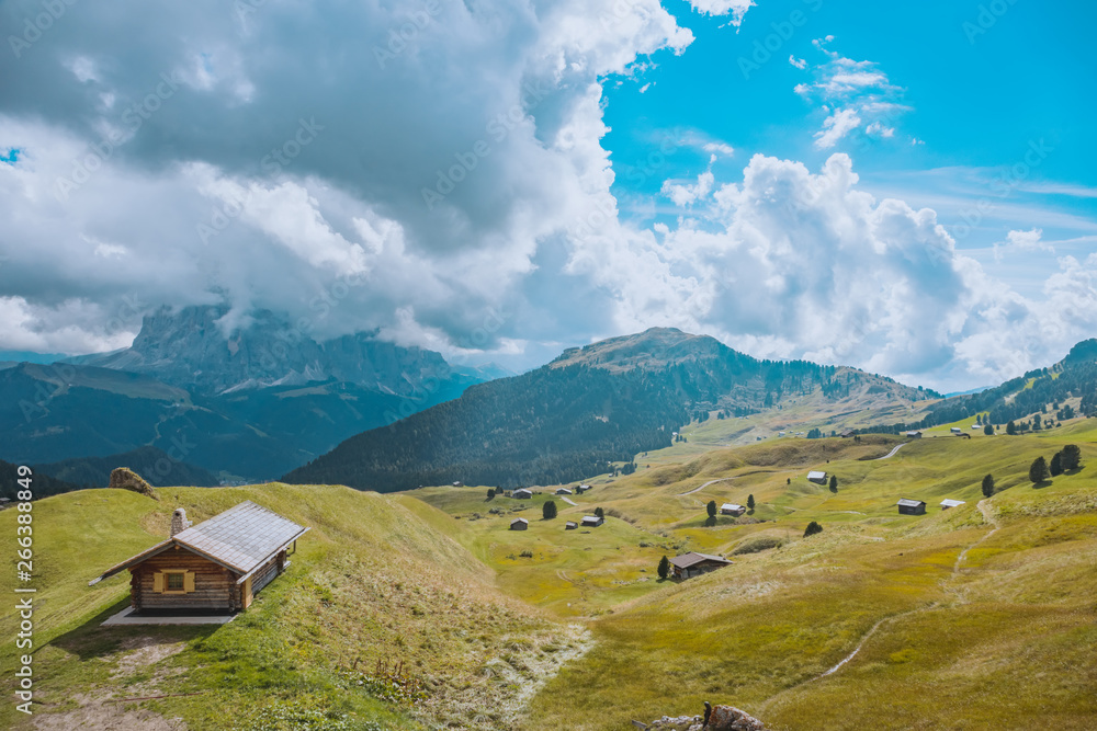 road and houses, green fields at Dolomites mountains, Odle Puez, Italy road and houses, green fields at Dolomites mountains, Odle Puez, Italy