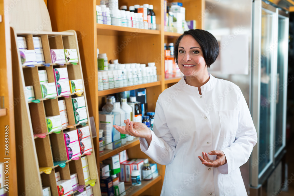 Female pharmacist in store