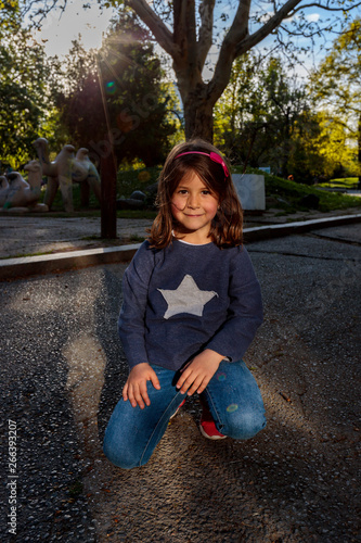 Ilina posing against sunbeams photo