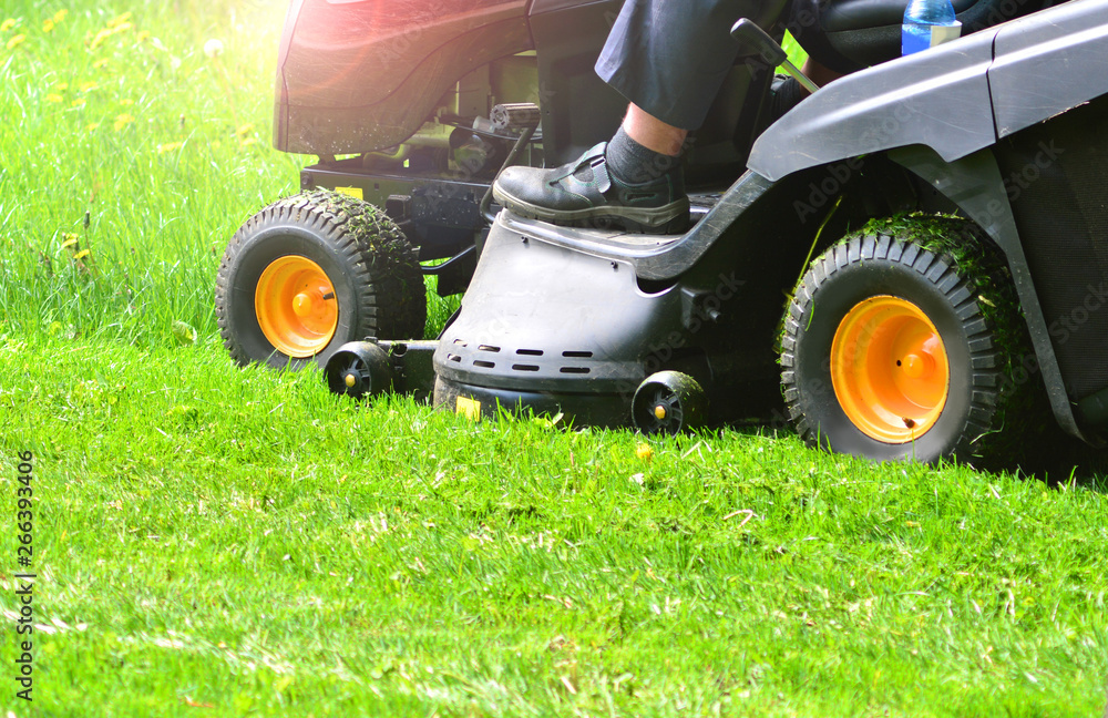 Green grass mowing with lawn mower Green grass mowing with lawn mower