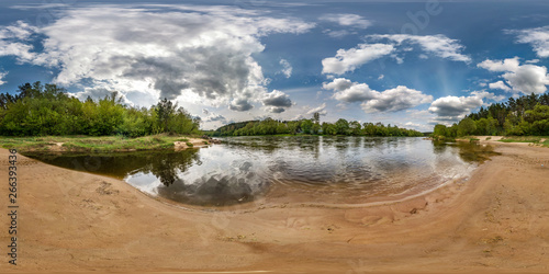 full seamless spherical panorama 360 degrees angle view on the shore of wide river neman with beautiful clouds in equirectangular projection, ready VR AR virtual reality content