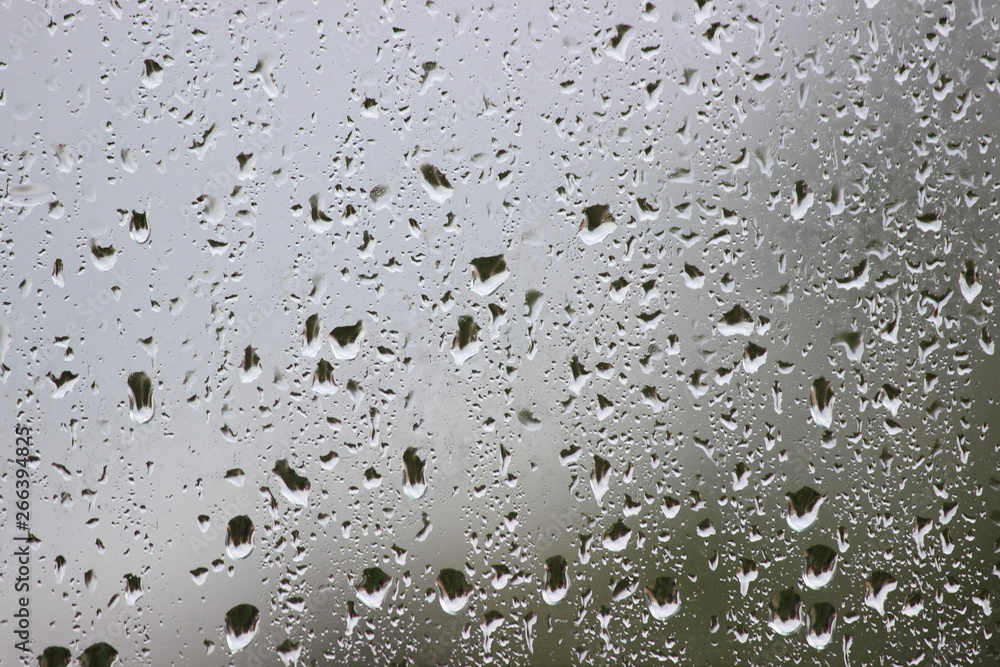 Water drops on wet glass close up, texture for background, depression Water drops on wet glass close up, texture for background, depression