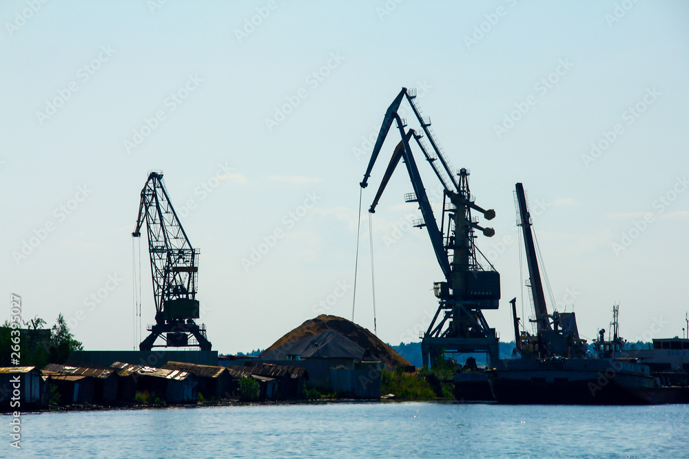 the mined sand cranes in the port