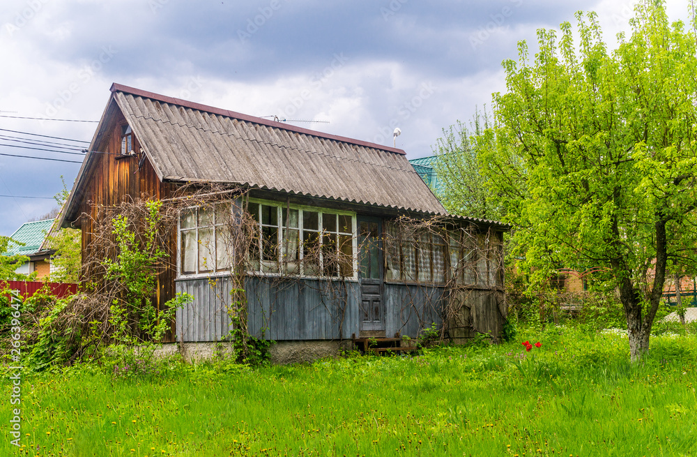 Picturesque old rustic abandoned house in Eastern Europe Picturesque old rustic abandoned house in Eastern Europe