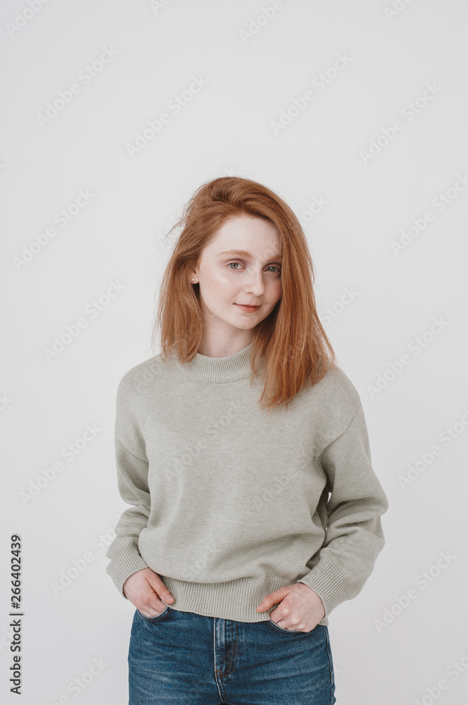 Young ginger woman looking at camera Young ginger woman looking at camera