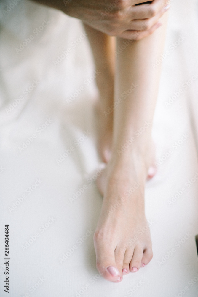 Female smooth shaved legs close up. Skin care Female smooth shaved legs close up. Skin care