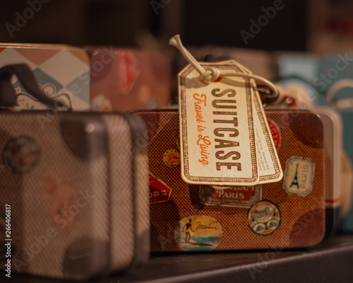 tiny tin suitcase