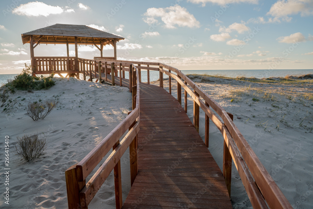 Very nice view of the access to the sea. Wooden sidewalk to the beach. Observation deck on the shores of the Baltic Sea. Very nice view of the access to the sea. Wooden sidewalk to the beach. Observation deck on the shores of the Baltic Sea.