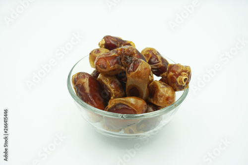 Kurma or dates fruits isolated on white background