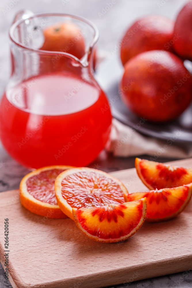 blood orange and juice on a dark background blood orange and juice on a dark background